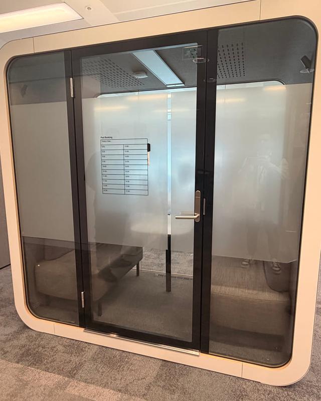 Four-person enclosed acoustic pod, white shell