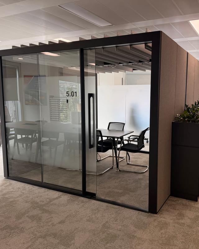 Acoustic meeting pod in an open-plan office